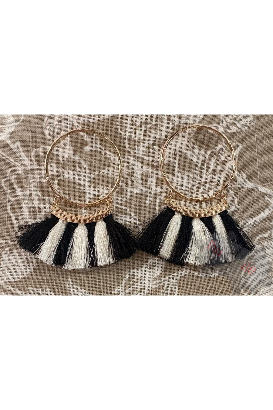 Md.Pendientes flecos